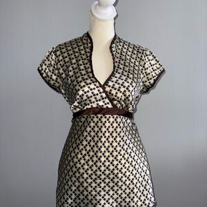 Tempted Geometric Top